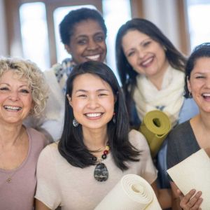 Group of ladies smiling and having a good time outside